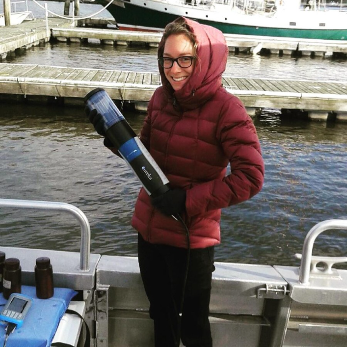 Kelsey with water quality monitoring equipment